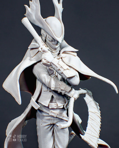 Close-up unpainted fantasy resin hunter holding a rifle with antlered hat and layered cloak details