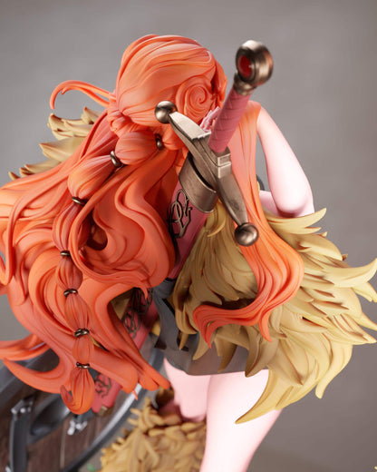 a detailed and colorful statue of a woman with long, flowing orange hair and a pink sword.
